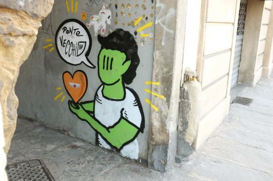 Граффити на улицах города Флоренция в Италии